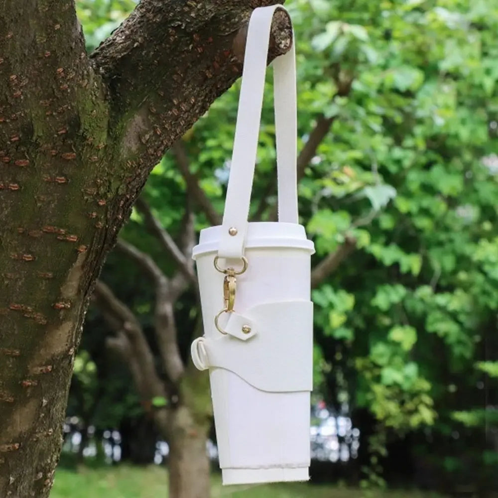 Portavasos de viaje de cuero.