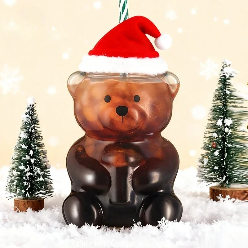 Taza de cristal con forma de oso con pajita y tapa.