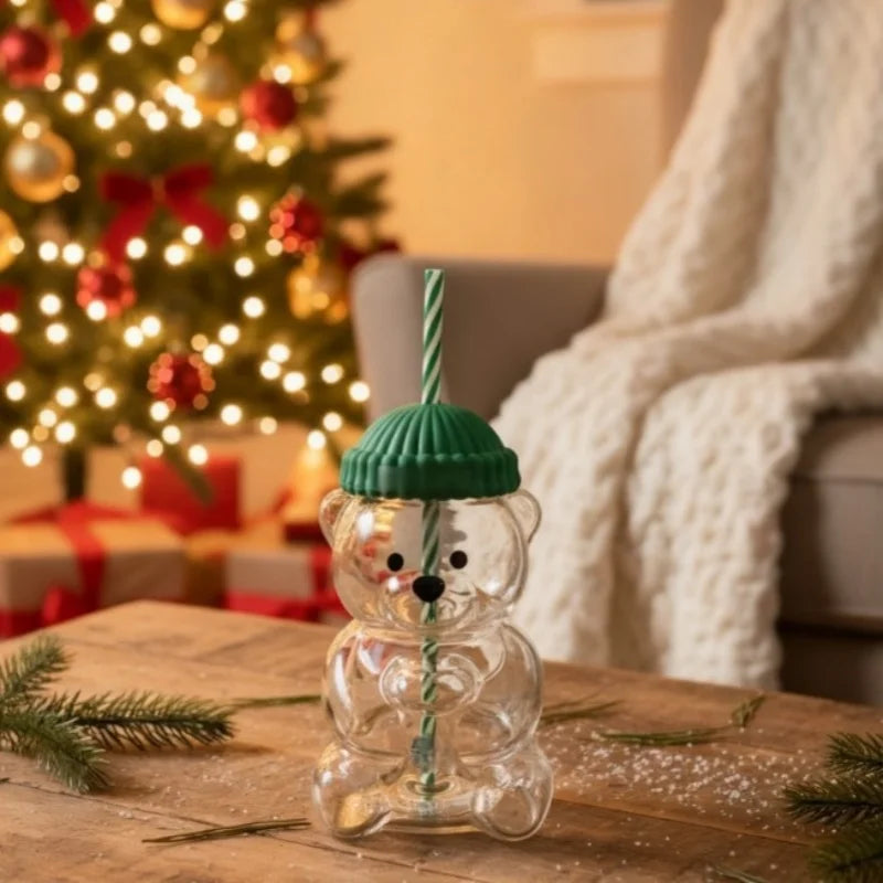 Taza de cristal con forma de oso con pajita y tapa.