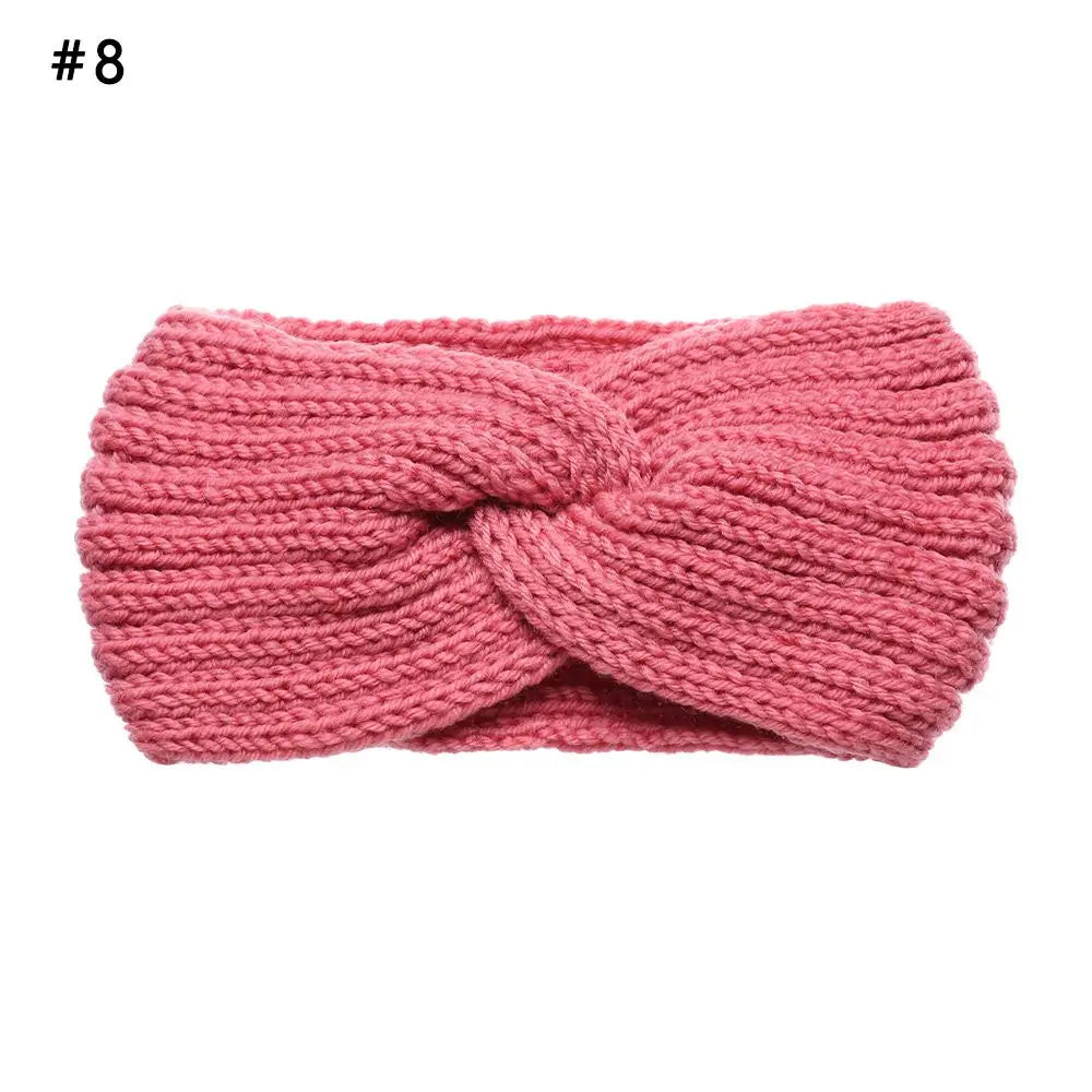 Vincha cruzada tejida.