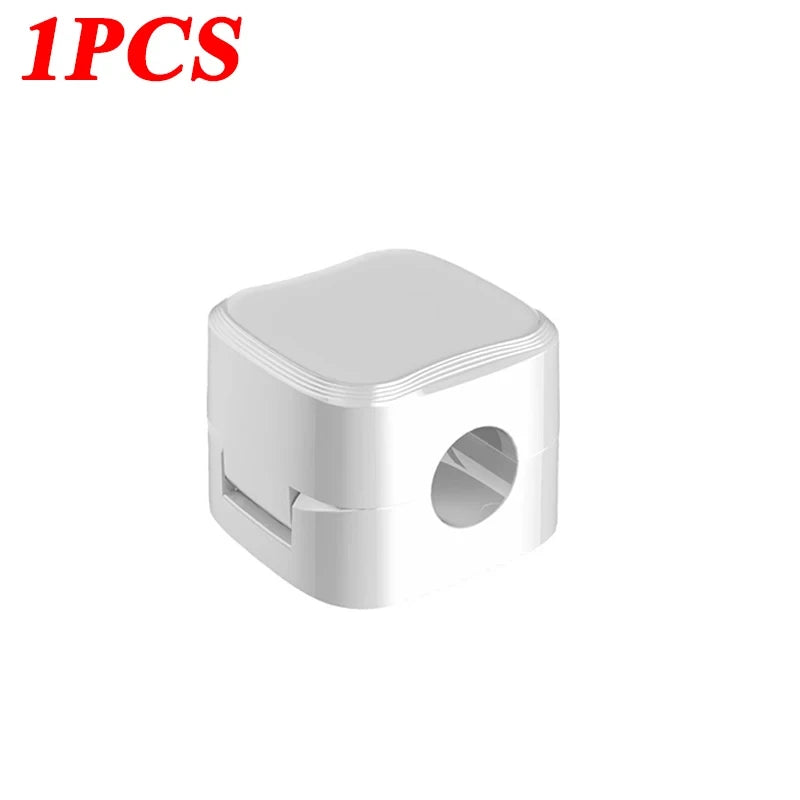 Organizador de cables adhesivo.